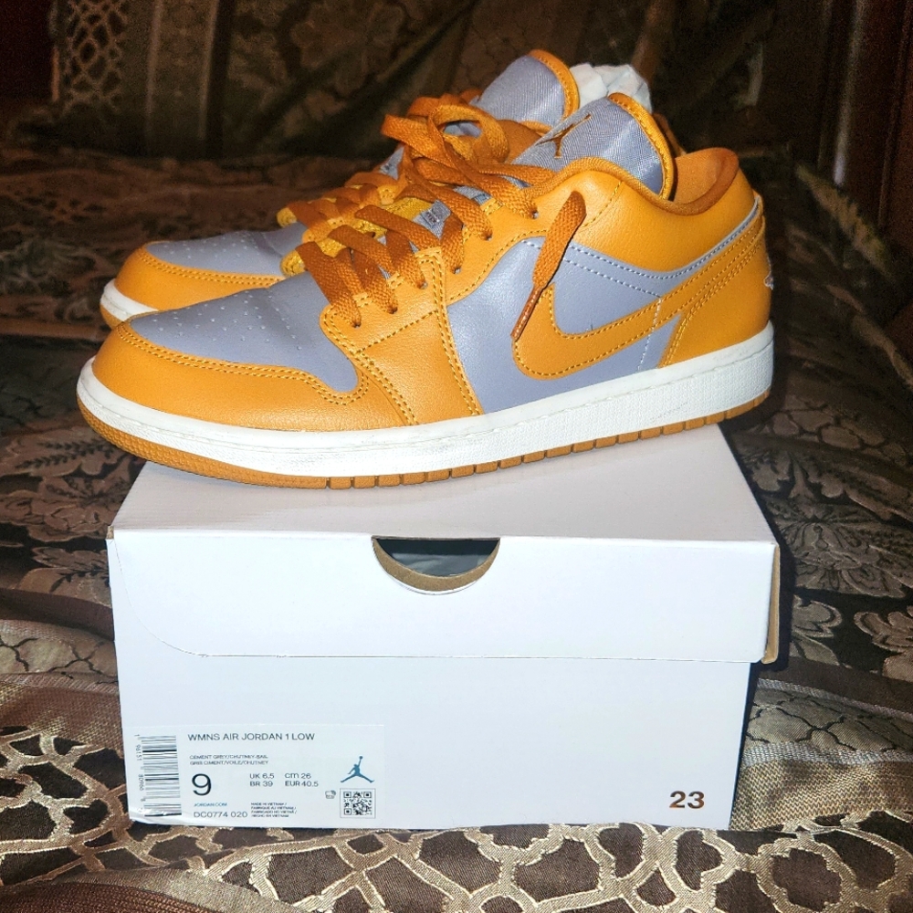 NIKE Women Air Jordan 1 Low.  Worn several times but they look really good